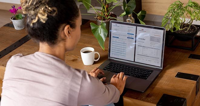 woman banking on laptop